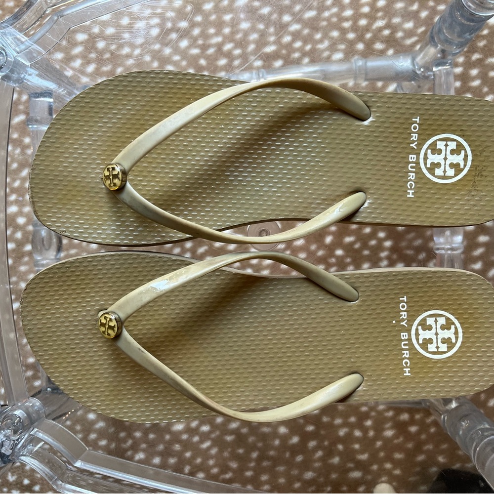 Tory Burch flip flops.